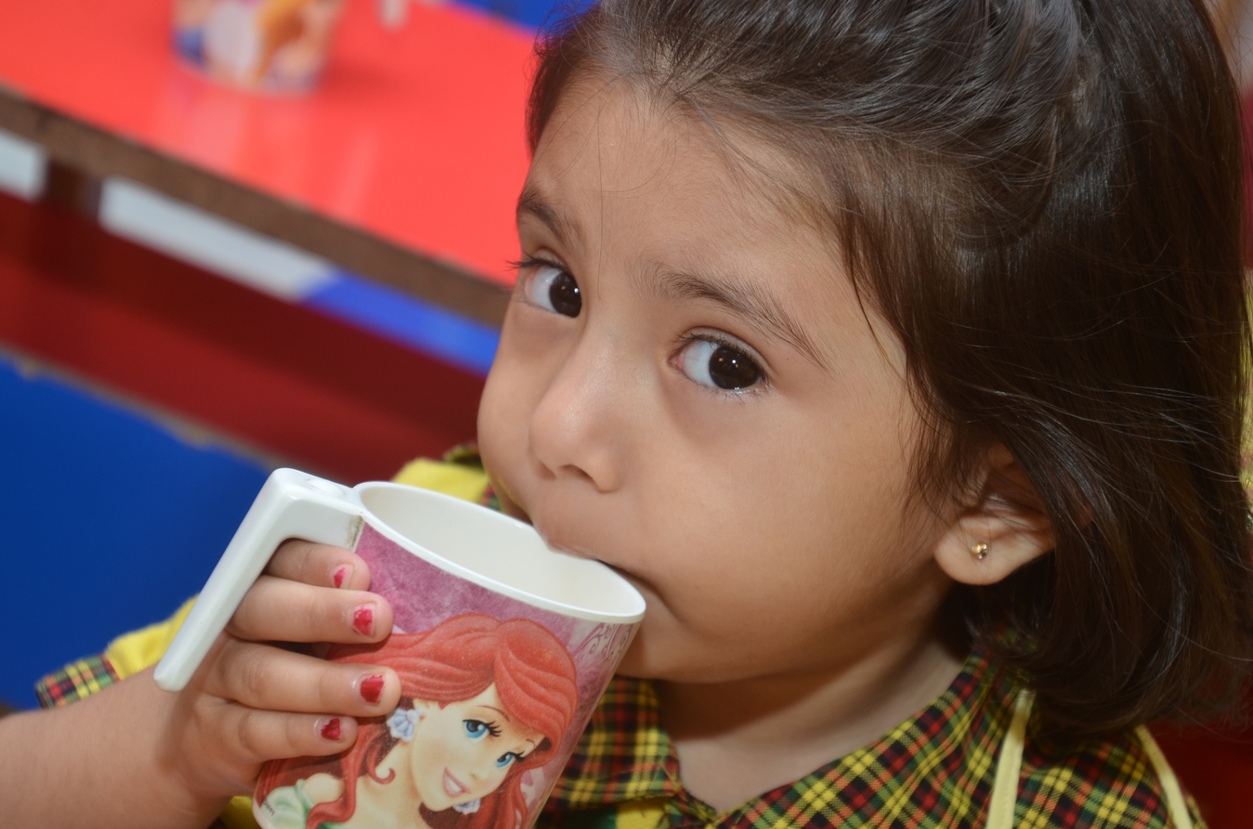 A little one taking a mid-morning drink break