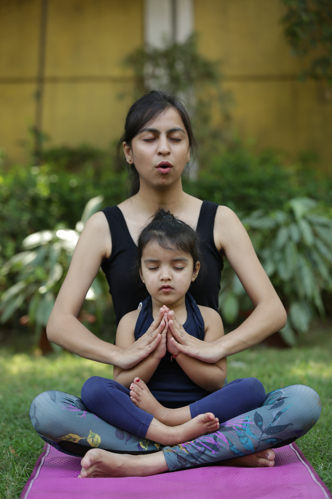 A child learning yoga and mindfulness